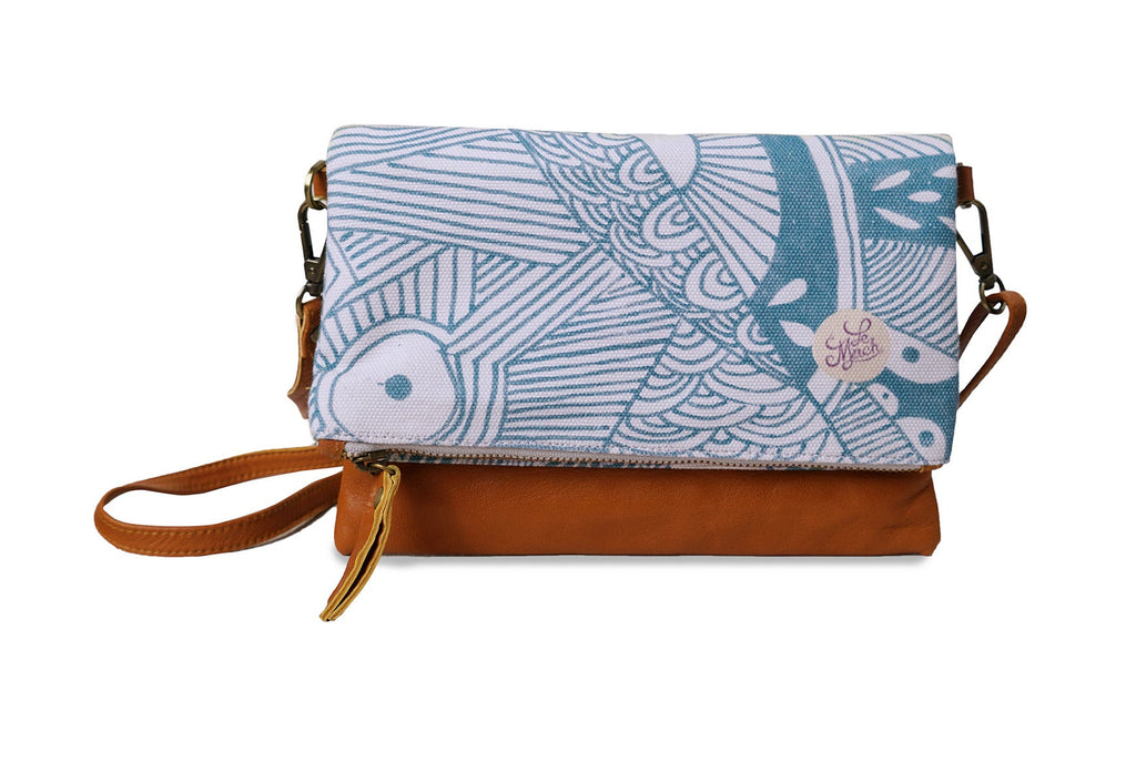 Blue patterned clutch bag with brown strap on a white background