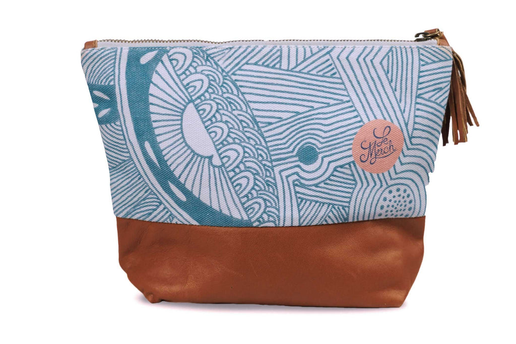 Cosmetic bag with blue patterned top and brown bottom on a white background