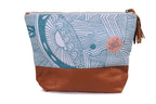 Cosmetic bag with blue patterned top and brown bottom on a white background